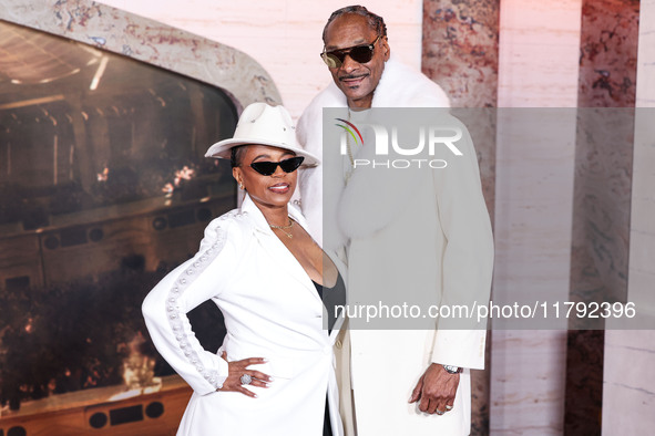 Shante Broadus and husband Snoop Dogg (Calvin Broadus Jr.) arrive at the Los Angeles Premiere Of Paramount Pictures' 'Gladiator II' held at...