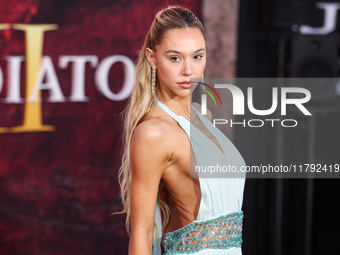 Alexis Ren arrives at the Los Angeles Premiere Of Paramount Pictures' 'Gladiator II' held at the TCL Chinese Theatre IMAX on November 18, 20...