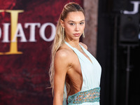 Alexis Ren arrives at the Los Angeles Premiere Of Paramount Pictures' 'Gladiator II' held at the TCL Chinese Theatre IMAX on November 18, 20...