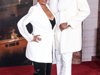 Shante Broadus and husband Snoop Dogg (Calvin Broadus Jr.) arrive at the Los Angeles Premiere Of Paramount Pictures' 'Gladiator II' held at...