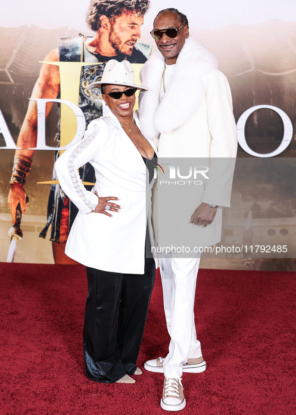 Shante Broadus and husband Snoop Dogg (Calvin Broadus Jr.) arrive at the Los Angeles Premiere Of Paramount Pictures' 'Gladiator II' held at...