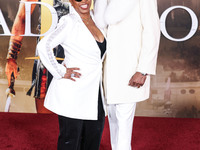 Shante Broadus and husband Snoop Dogg (Calvin Broadus Jr.) arrive at the Los Angeles Premiere Of Paramount Pictures' 'Gladiator II' held at...