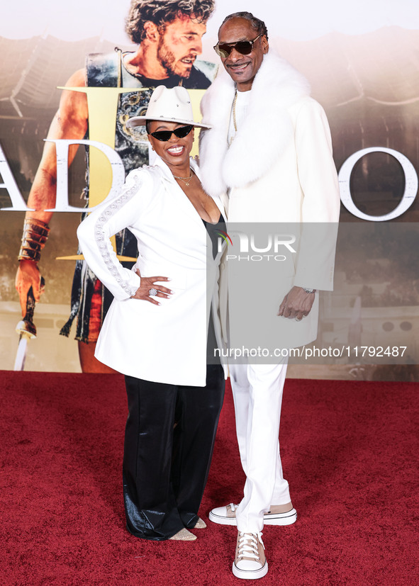 Shante Broadus and husband Snoop Dogg (Calvin Broadus Jr.) arrive at the Los Angeles Premiere Of Paramount Pictures' 'Gladiator II' held at...