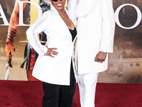 Shante Broadus and husband Snoop Dogg (Calvin Broadus Jr.) arrive at the Los Angeles Premiere Of Paramount Pictures' 'Gladiator II' held at...