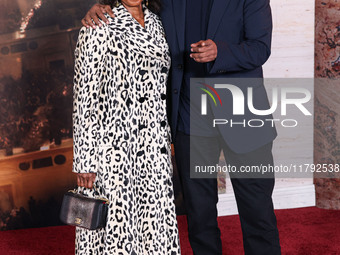 Pauletta Washington and husband Denzel Washington arrive at the Los Angeles Premiere Of Paramount Pictures' 'Gladiator II' held at the TCL C...