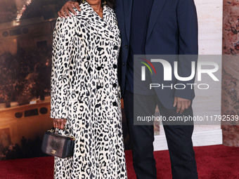 Pauletta Washington and husband Denzel Washington arrive at the Los Angeles Premiere Of Paramount Pictures' 'Gladiator II' held at the TCL C...