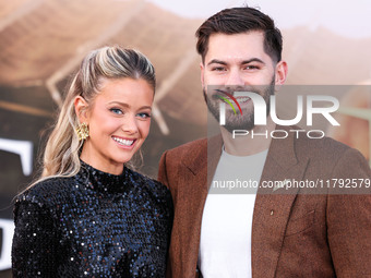 Hannah Godwin and husband Dylan Barbour arrive at the Los Angeles Premiere Of Paramount Pictures' 'Gladiator II' held at the TCL Chinese The...