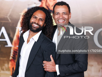 Makaylo Van Peebles and father Mario Van Peebles arrive at the Los Angeles Premiere Of Paramount Pictures' 'Gladiator II' held at the TCL Ch...