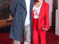 Kenya Barris and Rainbow Edwards-Barris arrive at the Los Angeles Premiere Of Paramount Pictures' 'Gladiator II' held at the TCL Chinese The...