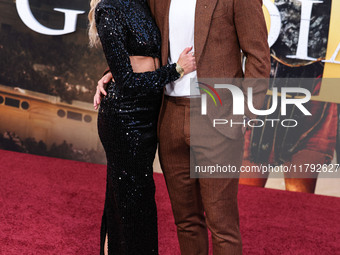 Hannah Godwin and husband Dylan Barbour arrive at the Los Angeles Premiere Of Paramount Pictures' 'Gladiator II' held at the TCL Chinese The...