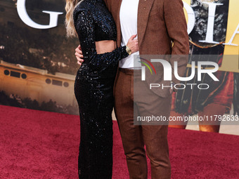 Hannah Godwin and husband Dylan Barbour arrive at the Los Angeles Premiere Of Paramount Pictures' 'Gladiator II' held at the TCL Chinese The...