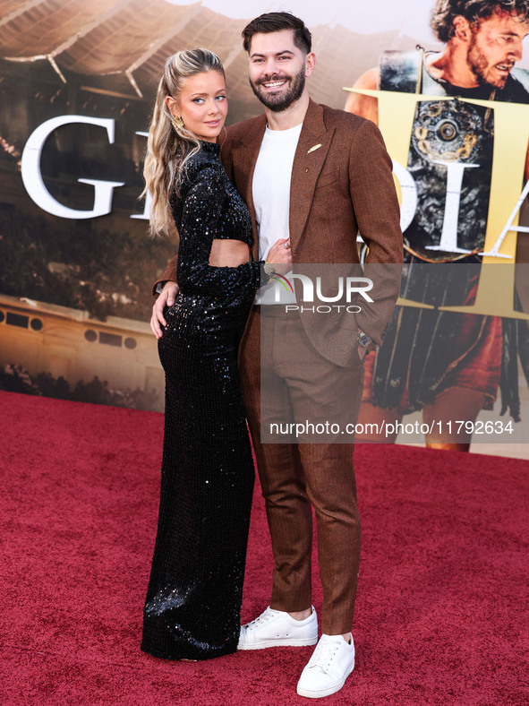 Hannah Godwin and husband Dylan Barbour arrive at the Los Angeles Premiere Of Paramount Pictures' 'Gladiator II' held at the TCL Chinese The...