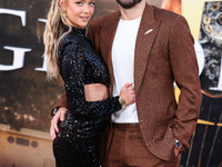 Hannah Godwin and husband Dylan Barbour arrive at the Los Angeles Premiere Of Paramount Pictures' 'Gladiator II' held at the TCL Chinese The...