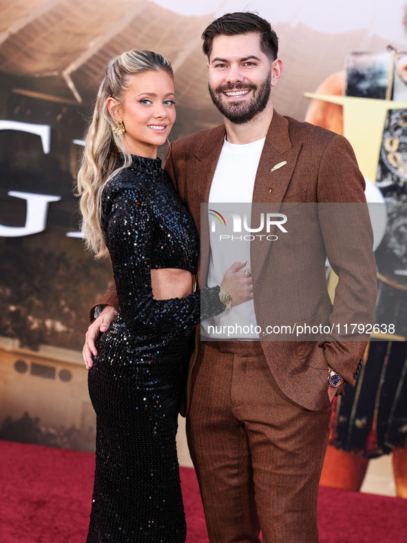 Hannah Godwin and husband Dylan Barbour arrive at the Los Angeles Premiere Of Paramount Pictures' 'Gladiator II' held at the TCL Chinese The...