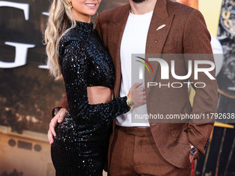 Hannah Godwin and husband Dylan Barbour arrive at the Los Angeles Premiere Of Paramount Pictures' 'Gladiator II' held at the TCL Chinese The...