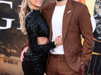 Hannah Godwin and husband Dylan Barbour arrive at the Los Angeles Premiere Of Paramount Pictures' 'Gladiator II' held at the TCL Chinese The...