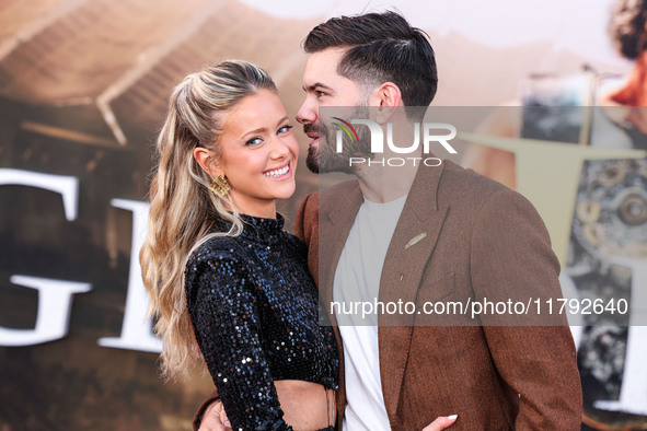 Hannah Godwin and husband Dylan Barbour arrive at the Los Angeles Premiere Of Paramount Pictures' 'Gladiator II' held at the TCL Chinese The...