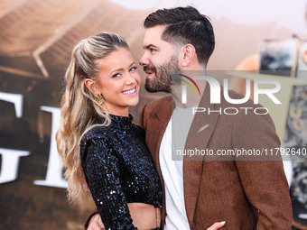 Hannah Godwin and husband Dylan Barbour arrive at the Los Angeles Premiere Of Paramount Pictures' 'Gladiator II' held at the TCL Chinese The...