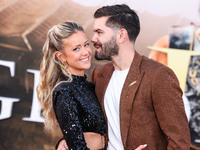 Hannah Godwin and husband Dylan Barbour arrive at the Los Angeles Premiere Of Paramount Pictures' 'Gladiator II' held at the TCL Chinese The...