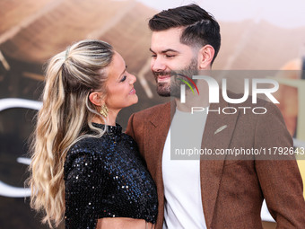 Hannah Godwin and husband Dylan Barbour arrive at the Los Angeles Premiere Of Paramount Pictures' 'Gladiator II' held at the TCL Chinese The...