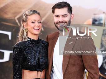 Hannah Godwin and husband Dylan Barbour arrive at the Los Angeles Premiere Of Paramount Pictures' 'Gladiator II' held at the TCL Chinese The...