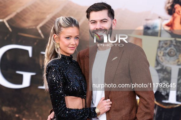 Hannah Godwin and husband Dylan Barbour arrive at the Los Angeles Premiere Of Paramount Pictures' 'Gladiator II' held at the TCL Chinese The...