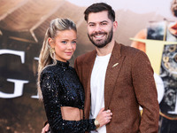 Hannah Godwin and husband Dylan Barbour arrive at the Los Angeles Premiere Of Paramount Pictures' 'Gladiator II' held at the TCL Chinese The...