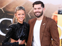 Hannah Godwin and husband Dylan Barbour arrive at the Los Angeles Premiere Of Paramount Pictures' 'Gladiator II' held at the TCL Chinese The...