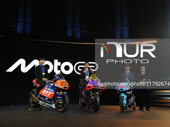 Ai Ogura (L) of Japan and Moto2 champion, Jorge Martin (89) of Spain and MotoGP Champion and David Alonso (80) of Colombia and Moto3 Champio...