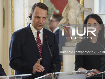 Polish Minister of Foreign Affairs Radoslaw Sikorski gestures as he addresses the media during the EU's Big Five press conference after talk...