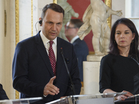 Polish Minister of Foreign Affairs Radoslaw Sikorski gestures as he addresses the media during the EU's Big Five press conference after talk...