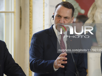 Polish Minister of Foreign Affairs Radoslaw Sikorski gestures as he addresses the media during the EU's Big Five press conference after talk...