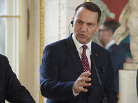 Polish Minister of Foreign Affairs Radoslaw Sikorski gestures as he addresses the media during the EU's Big Five press conference after talk...