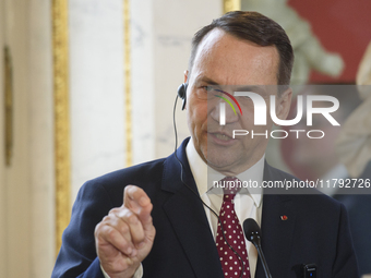 Polish Minister of Foreign Affairs Radoslaw Sikorski gestures as he addresses the media during the EU's Big Five press conference after talk...