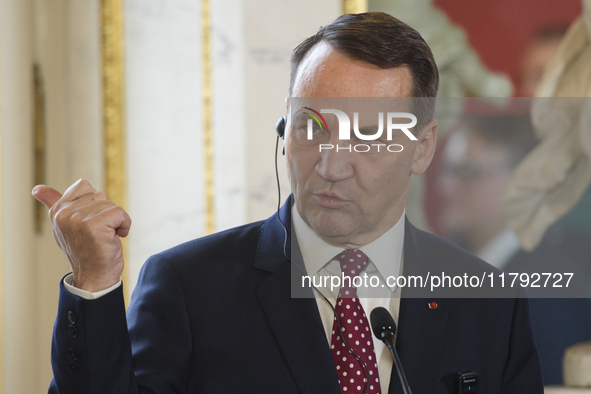 Polish Minister of Foreign Affairs Radoslaw Sikorski gestures as he addresses the media during the EU's Big Five press conference after talk...