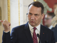 Polish Minister of Foreign Affairs Radoslaw Sikorski gestures as he addresses the media during the EU's Big Five press conference after talk...