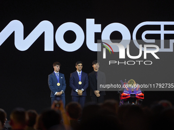 Ai Ogura (R) of Japan and Moto2 champion, Jorge Martin (C) of Spain and MotoGP Champion and David Alonso (L) of Colombia and Moto3 Champion...