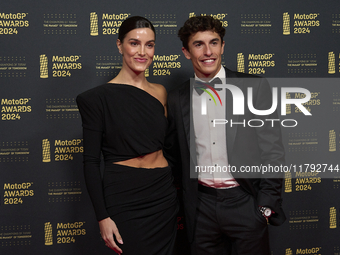 Marc Marquez of Spain and Gresini Racing Moto GP Ducati with his girlfriend Gemma Pinto on the red carpet before the MotoGP Awards 2024 at t...