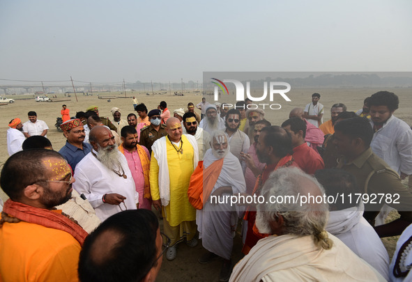 Sadhus (holy men) arrive on the banks of the Sangam area for the allotment of land for the Maha Kumbh 2025 Festival in Prayagraj, India, on...