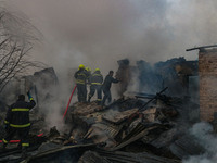 Firefighters work to extinguish a fire on residential houses in Srinagar, Jammu and Kashmir, on November 19, 2024. (