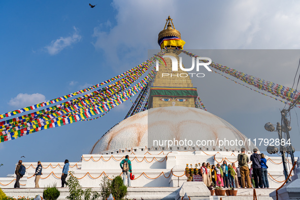 Tourists visit around the Boudhanath Stupa in Kathmandu, Nepal, on November 19, 2024. 