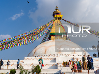 Tourists visit around the Boudhanath Stupa in Kathmandu, Nepal, on November 19, 2024. (