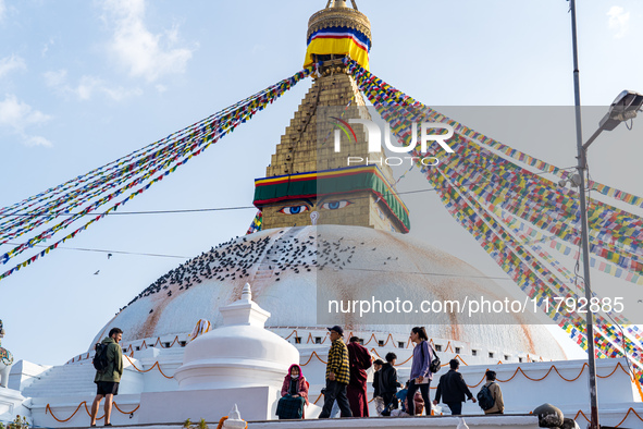 Tourists visit around the Boudhanath Stupa in Kathmandu, Nepal, on November 19, 2024. 