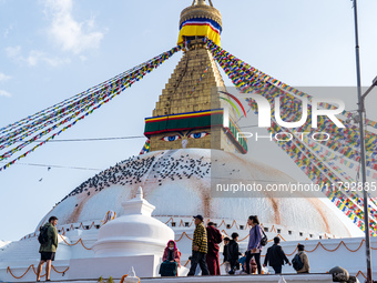 Tourists visit around the Boudhanath Stupa in Kathmandu, Nepal, on November 19, 2024. (