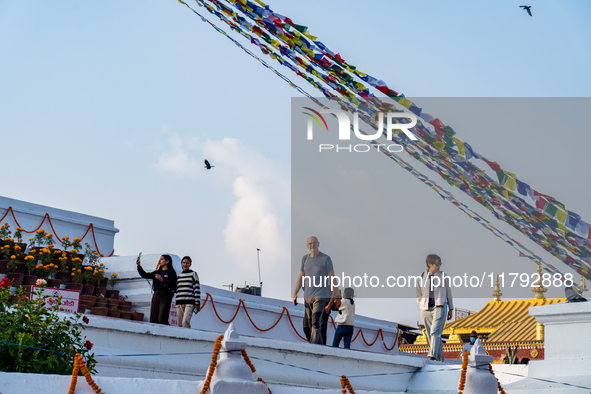 Tourists visit around the Boudhanath Stupa in Kathmandu, Nepal, on November 19, 2024. 