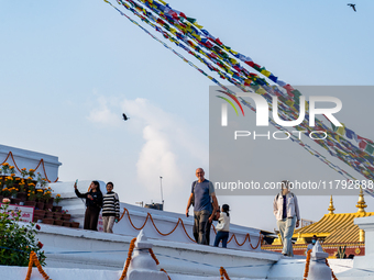 Tourists visit around the Boudhanath Stupa in Kathmandu, Nepal, on November 19, 2024. (