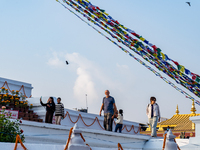 Tourists visit around the Boudhanath Stupa in Kathmandu, Nepal, on November 19, 2024. (