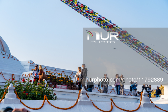 Tourists visit around the Boudhanath Stupa in Kathmandu, Nepal, on November 19, 2024. 