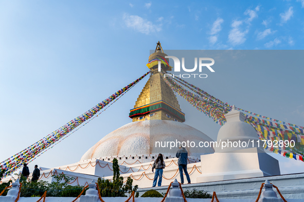 Tourists visit around the Boudhanath Stupa in Kathmandu, Nepal, on November 19, 2024. 