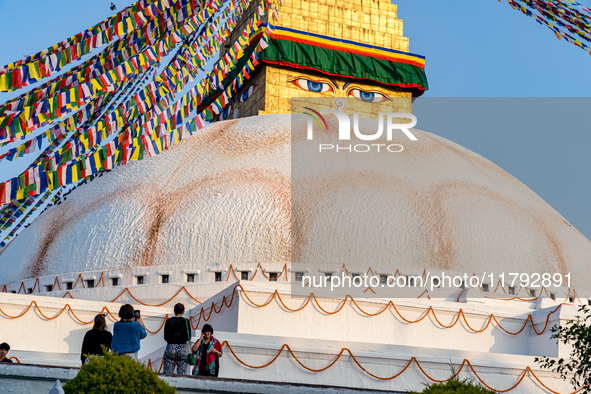 Tourists visit around the Boudhanath Stupa in Kathmandu, Nepal, on November 19, 2024. 